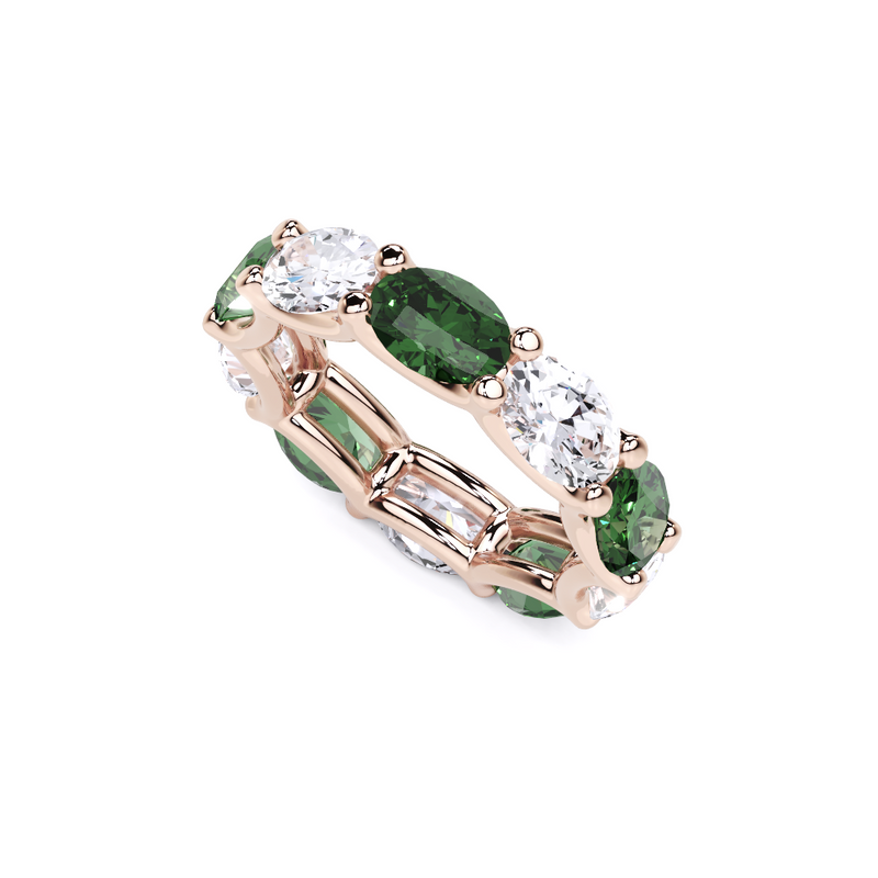 Oval Cut Emerald and Diamond Ring