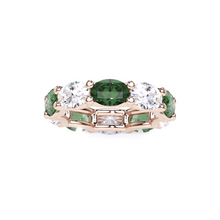 Oval Cut Emerald and Diamond Ring